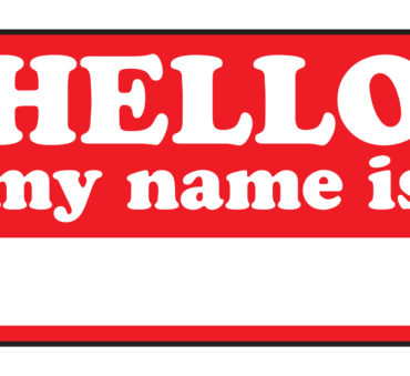 A blank name tag that says HELLO MY NAME IS represents a Lake Forest divorce attorney.