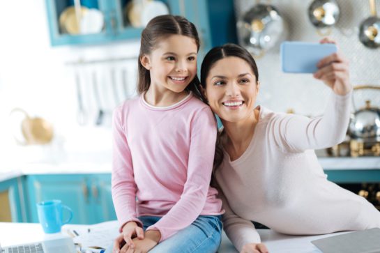 mother and daughter spending time with each to receive the right child support speak with a Cook County Divorce lawyer