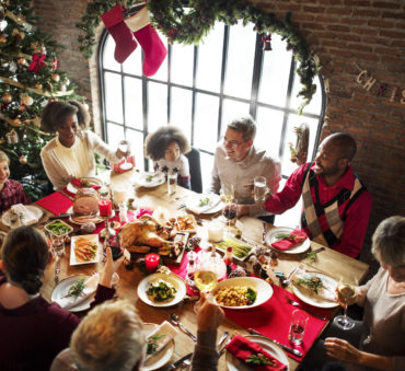 family gathering to celebrate Christmas, if going through divorce seek counsel from an experienced family law attorney in Chicago.